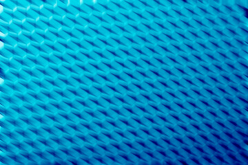 Surface pattern of blue texture with a geometric design on a flat background