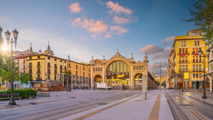 Iconic cityscape of Zaragoza, Spain, showing the Central Market and the remains of the Roman city walls