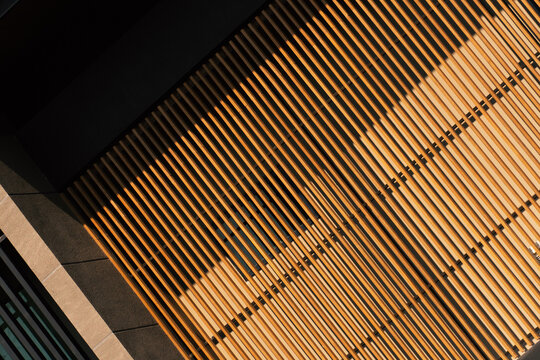 gray cement and wood panel in detail of architecture background