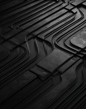 black matte bipolar plates, square thin plates with grooves all along the surfece, 2mm deep, all connected together