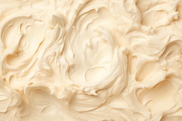 Obraz premium Creamy frosting creating a background of swirls, waves, and textured peaks