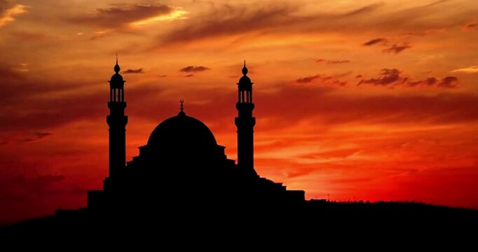 silhouette of a mosque with domes and minarets against a vibrant sunset. generated with AI