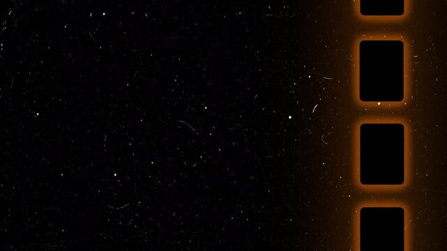 Vintage 8mm film sprocket and wide film matte frame in 4K. Old film texture overlay background with grain and scratches, ideal for retro compositions, intros, and cinematic effects.