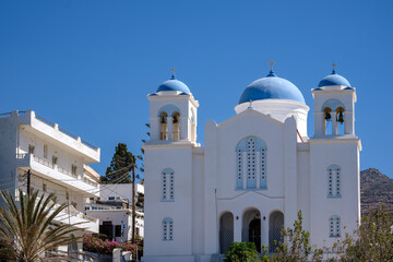 View of a beautiful whitewashed orthodox cathedral in Ios Greece