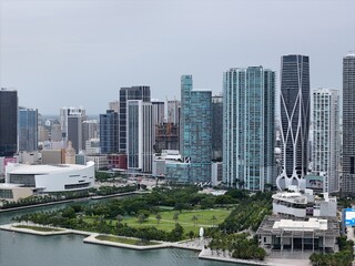 Fototapeta premium defaultMiami downtown skyline with modern high-rise buildings and a bridge over the bay under cloudy daylight. g.