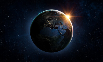 View from space of the sunrise over planet Earth and Sun. Elements of this image furnished by NASA.