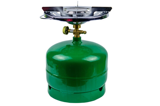 Green propane gas cylinder with burner isolated on white background