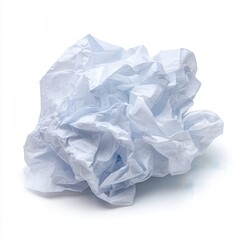 Obraz premium Crumpled paper sits on a plain surface, showcasing a moment in a workspace or classroom setting