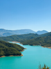 Fototapeta premium Lake Bovilla in Albania – Turquoise Mountain Reservoir Panorama
