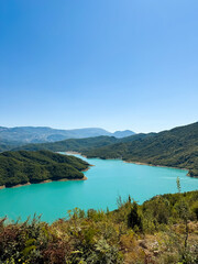 Fototapeta premium Lake Bovilla in Albania – Turquoise Mountain Reservoir Panorama, Gamti Mountain - Hiking area in Krujë