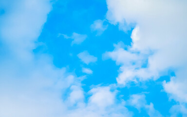 Blue sky with strange and beautiful cloud formations in Thailand.