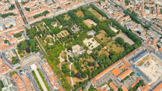 Nancy, France. Pepinier Park - Forest park with walking paths, rose garden, playgrounds and sports grounds. Summer, Sunny day. Drone footage