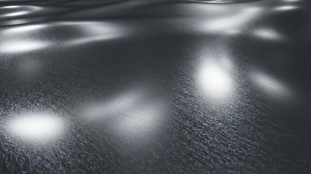 Abstract underwater light patterns and bubbles in dark water.
