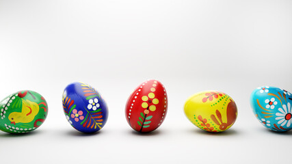 Hand painted local folk easter eggs on a white background