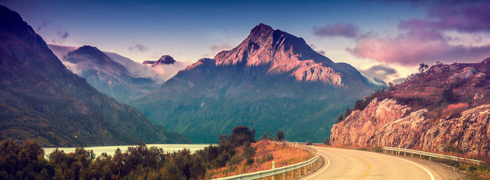 Driving a car on mountain road. Nature Norway. Polar circle. Lofoten islands