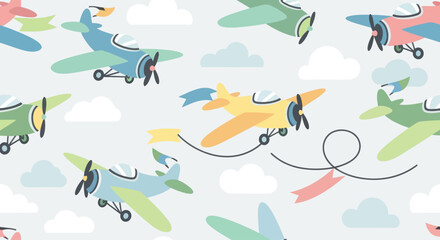 Colorful retro airplanes flying among clouds in a seamless pattern. © Mardiyo