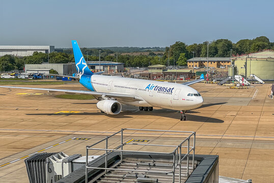 Airplane of Air Transat staying at Gatwick airport. Air Transat is a Canadian airline headquartered in Montreal, Quebec.