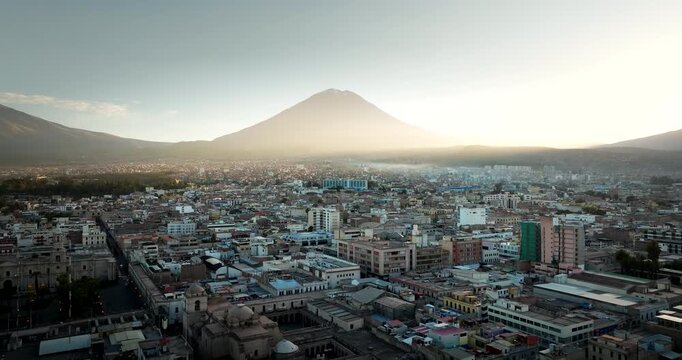 Sunrise aerial cityscape view of Arequipa Peru with silhouette of Misti volcano