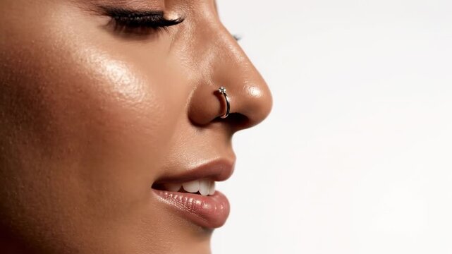 Woman side profile with glowing skin shown in sequence, highlighting a subtle nose piercing and a natural smile