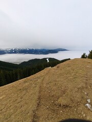 mountain landscape with snow and clouds