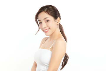 A beautiful young Asian woman with clean, fresh skin against a white background. Skincare, facial treatment, cosmetology, beauty, and spa. An elegant portrait of an Asian woman.