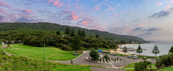 Sea Cliff Bridge on the southern coast of Sydney with sweeping Ocean Views and Mountain terrain. a...