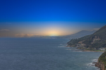 Sea Cliff Bridge on the southern coast of Sydney with sweeping Ocean Views and Mountain terrain. a major Bridge Road on the beautiful Australian coastline