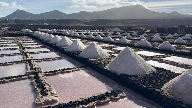 Salt mounds and pink pools at Janubio salt flats Lanzarote