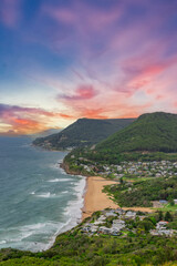 Fototapeta premium Sea Cliff Bridge on the southern coast of Sydney with sweeping Ocean Views and Mountain terrain. a major Bridge Road on the beautiful Australian coastline 