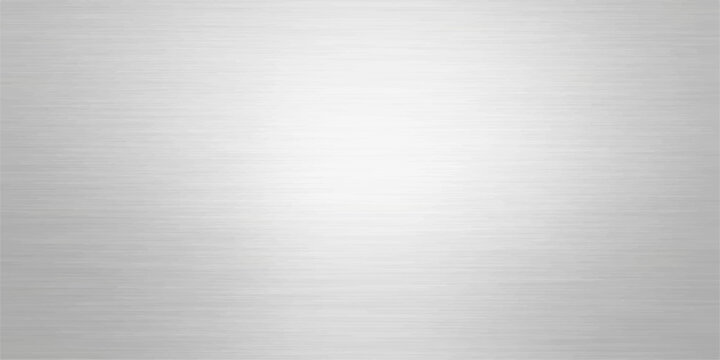 A seamless brushed metal texture features a silver stainless steel plate background with a shiny metallic aluminum surface pattern for a gray industrial backdrop design