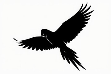 Obraz premium Graceful silhouette of a bird in mid-flight against a plain background