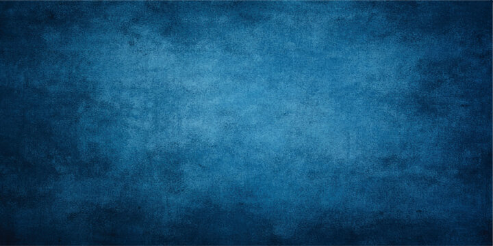 Aged blue grunge texture with a dark vintage pattern on a rough concrete wall surface creates a grungy paper backdrop for a blank design