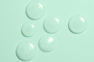 Drops of cosmetics. Facial serum or micellar water or gel.
