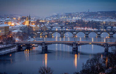 Naklejka premium city, architecture, church, czech, night, view, sunset, europe, travel, skyline, cityscape, snow, building, prague, landmark, sky, landscape, tower, winter, cathedral, old, castle, charles, tourism
