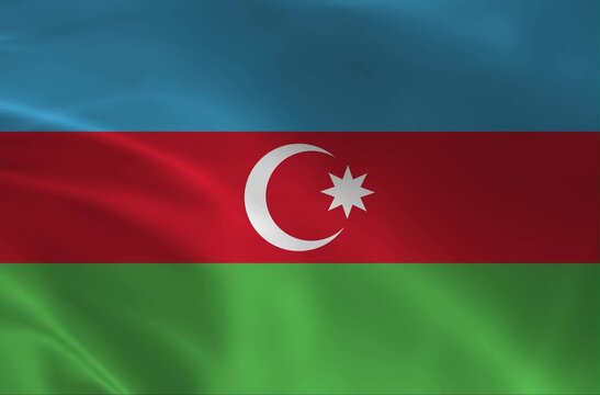 The national flag of Azerbaijan, a vibrant tricolor of blue red and green with a white crescent and eight pointed star fluttering in a seamless loop