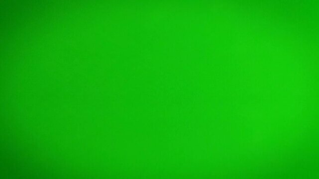 Green Screen Display in Silver Frame on Wall