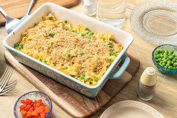 Retro style casserole food made with chicken, noodles, and vegetables