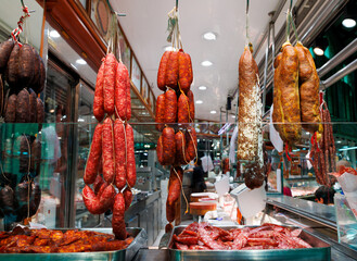 A traditional food market stall with a variety of cured sausages A Taste of Gastronomy