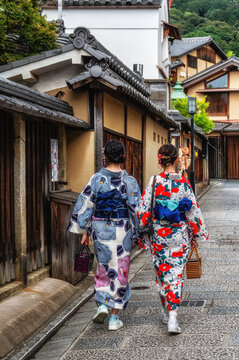 Tourist wearing japanese traditional kimono at Yasaka Pagoda in Kyoto, Japan.