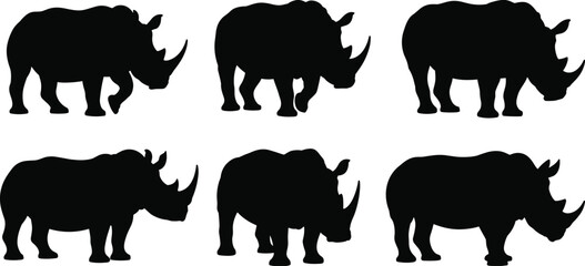 Black silhouettes of rhinoceroses in diverse poses with varied horn shapes and body stances, perfect for wildlife illustration, safari design, conservation art, and educational use © MDAMIRHAMJA