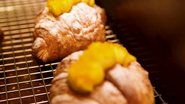 croissant with mango and powdered sugar