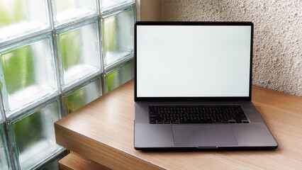 Modern Space Gray MacBook Pro Mockup on Minimalist Wooden Desk with Blank Screen
