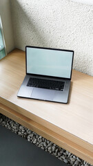 Modern Space Gray MacBook Pro Mockup on Minimalist Wooden Desk with Blank Screen