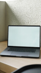 Modern Space Gray MacBook Pro Mockup on Minimalist Wooden Desk with Blank Screen