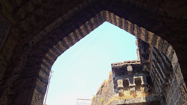 The grand stone archway at Sajjangad Fort showcases classic Maratha architecture. Its rugged, massive stonework reflects the historic defensive strength and spiritual legacy of the famous Maharashtra