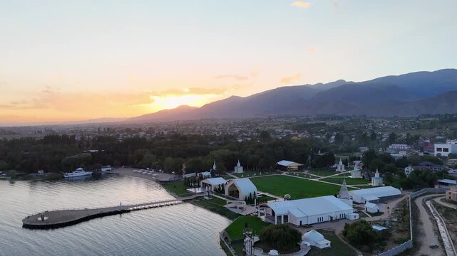 Cholpon Ata, Kyrgyzstan &ndash; December 2, 2025: Clear blue Issyk Kul Lake with mountain views near this popular tourist destination.