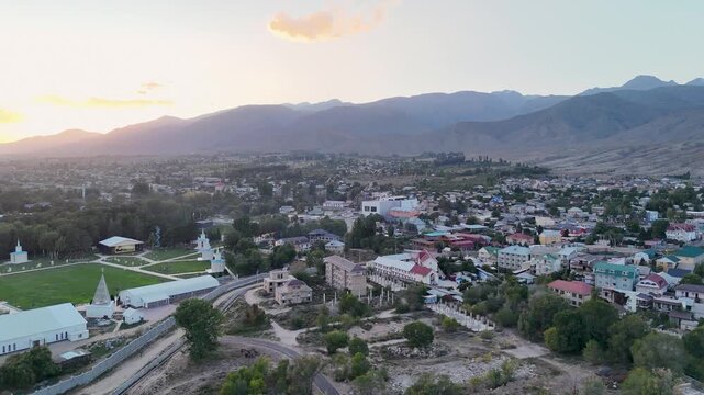 Cholpon Ata, Kyrgyzstan &ndash; December 2, 2025: Clear blue Issyk Kul Lake with mountain views near this popular tourist destination.