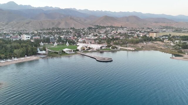 Cholpon Ata, Kyrgyzstan &ndash; December 2, 2025: Clear blue Issyk Kul Lake with mountain views near this popular tourist destination.