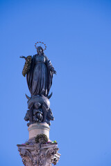 Grace and devotion soar above Rome: the Madonna atop the Colonna dell'Immacolata Concezione in Piazza Mignanelli , in the heart of Rome,  watches over the Eternal City with timeless elegance.