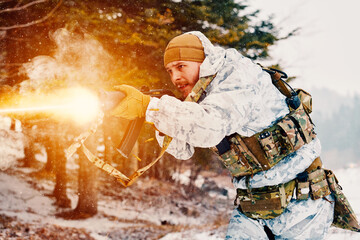 Obraz premium Soldier Firing Assault Rifle in Winter Camouflage With Muzzle Flash in Snowy Forest Combat Scene